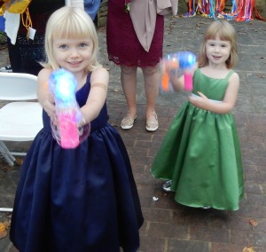 Julia and Madeline armed with bubble guns.