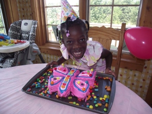 Maya celebrating her eighth birthday